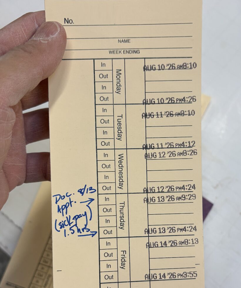 A paper weekly punch card, Monday to Friday, with a handwritten note in the margin.